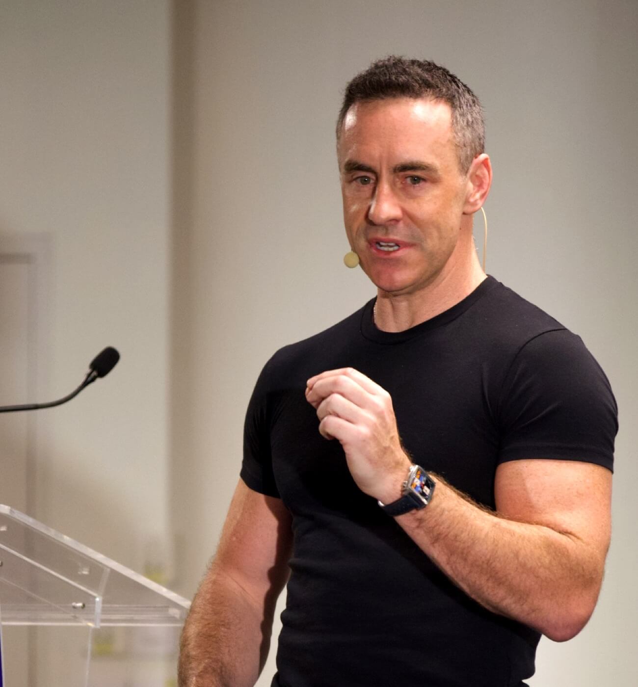Bryan Adams presenting at a conference